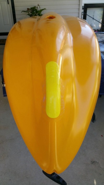 Bottom of kayak seen from above showing the hull protector made with InstaMorph moldable plastic.