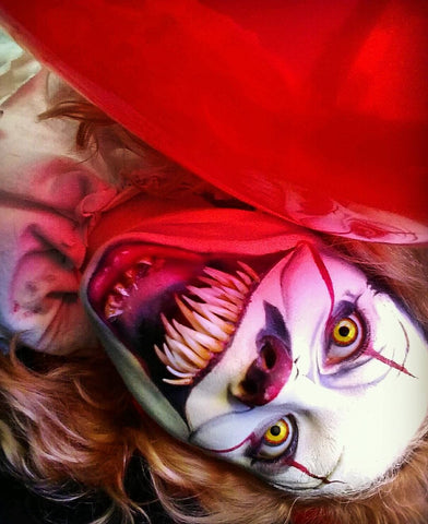 Almost upside down close up of Pennywise costume face showing costume teeth made with InstaMorph moldable plastic.