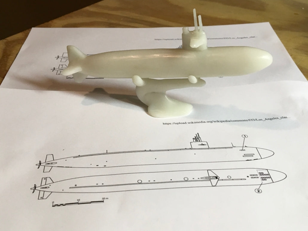 One submarines that fits on an 8 by 10 piece of paper made out of InstaMorph. Also showing is the drawing of the submarine dimensions.