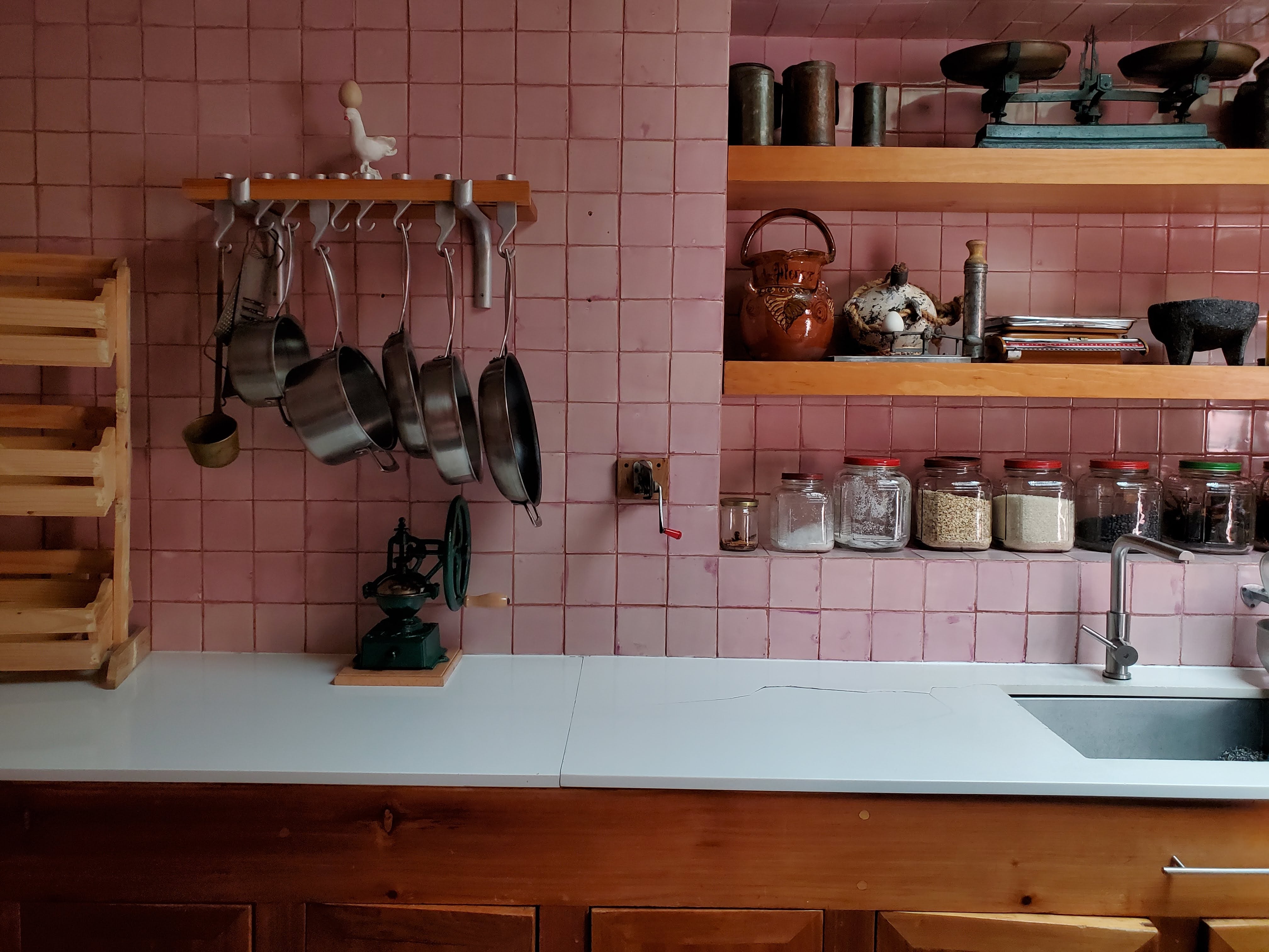 Pink tiled kitchen at Casa Pedregal designed by Luis Barragán in Mexico City.