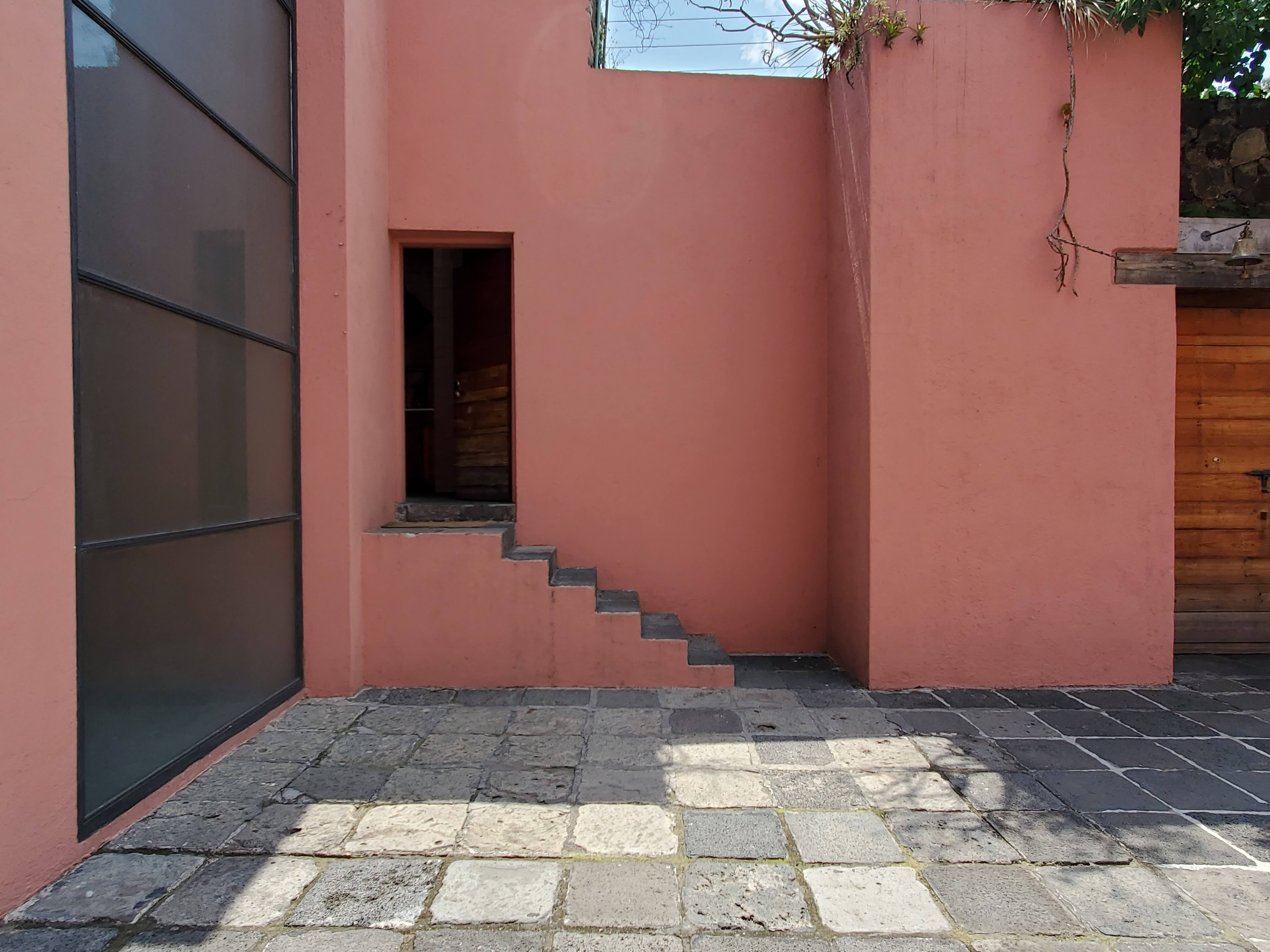 Pink exterior at casa pedegral in mexico city.