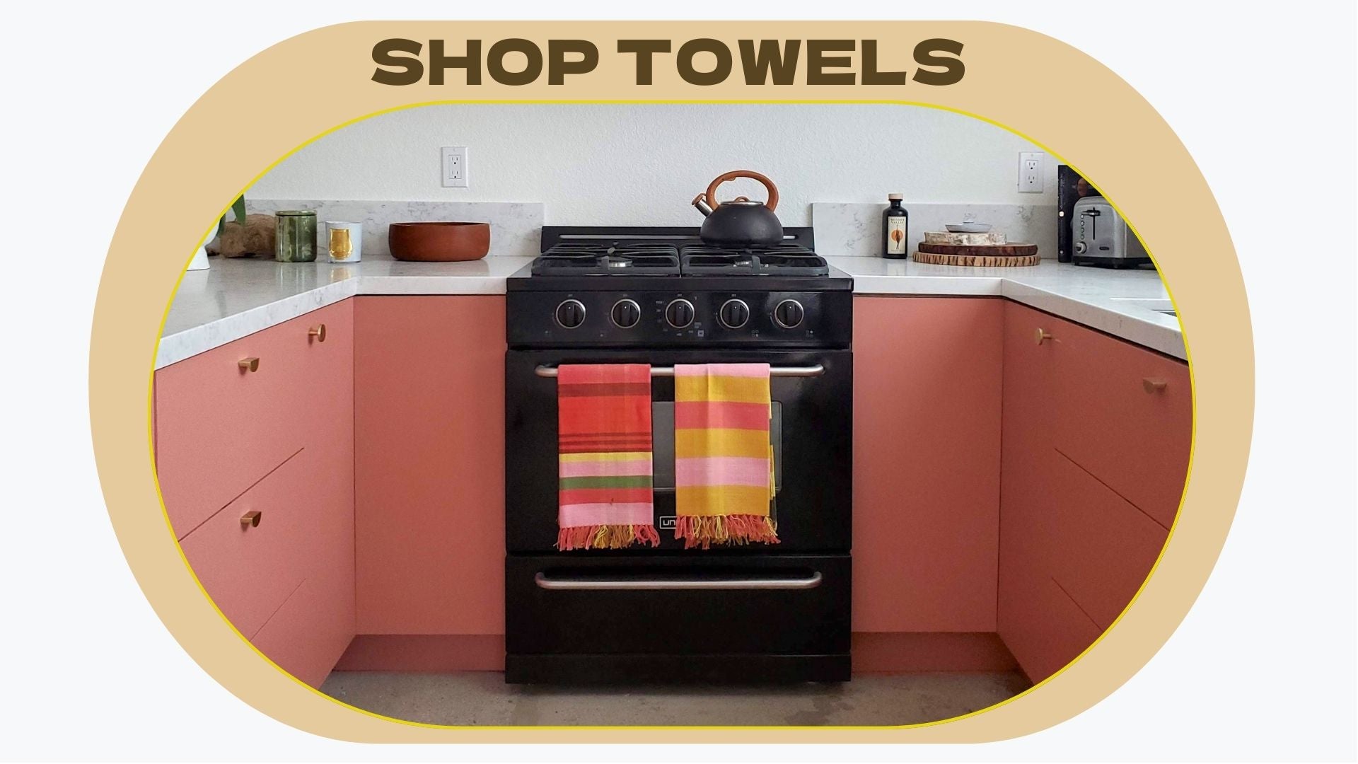 pink towels in a pink kitchen