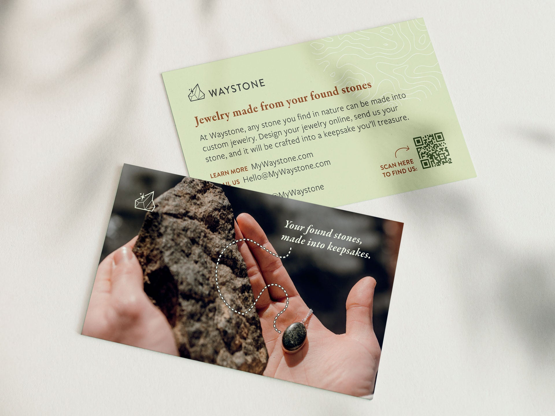 A business card design for Waystone that reads, "Jewelry made from your found stones."