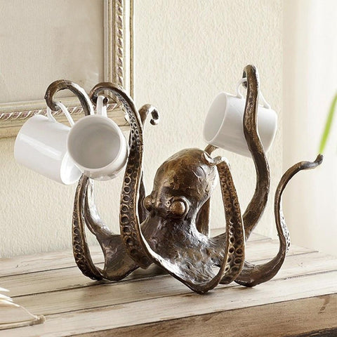 Bronze octopus coffee cup or hot cocoa mug holder, carries a mug on each tentacle and is adorable to boot!  