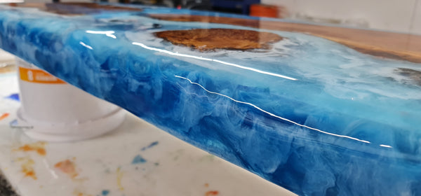 Wall text: Do you have Magic Resin Table Top & Art Epoxy Resin