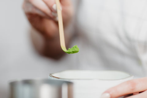 A serving size of matcha powder for matcha tea