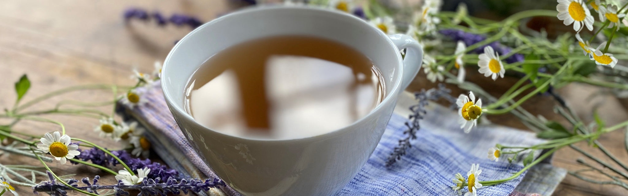 Cup of herbal tea with lavender ingredients