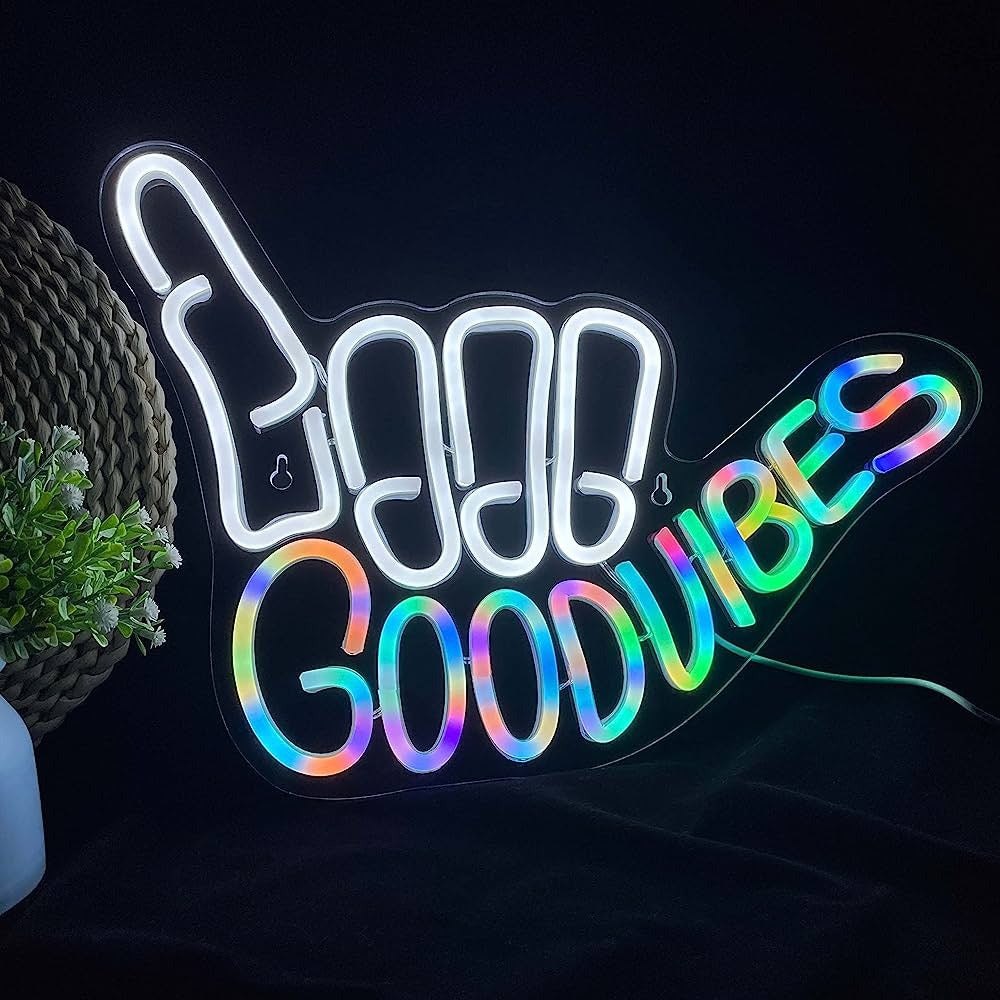 “Good Vibes” neon sign brings joy with unique shape