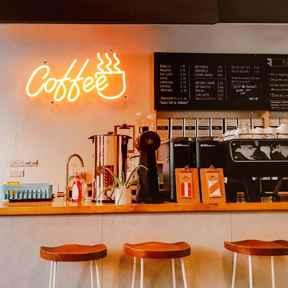 Coffee neon sign - a decorative element for a cafe.