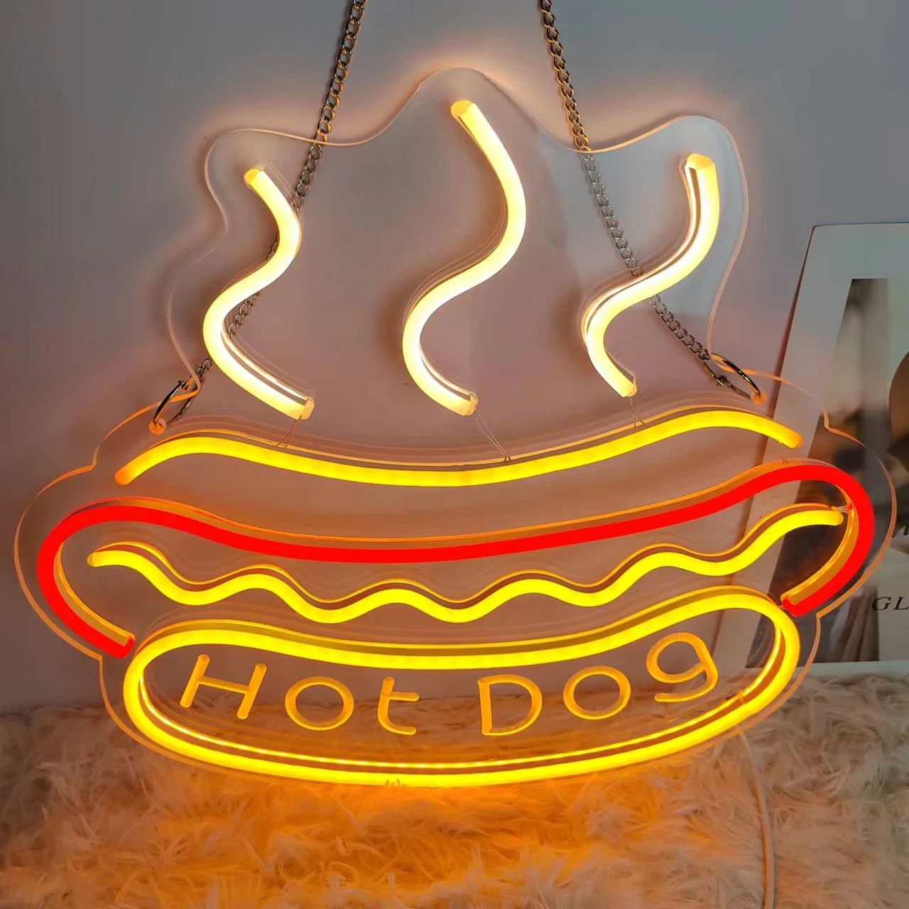 A neon sign with a food design