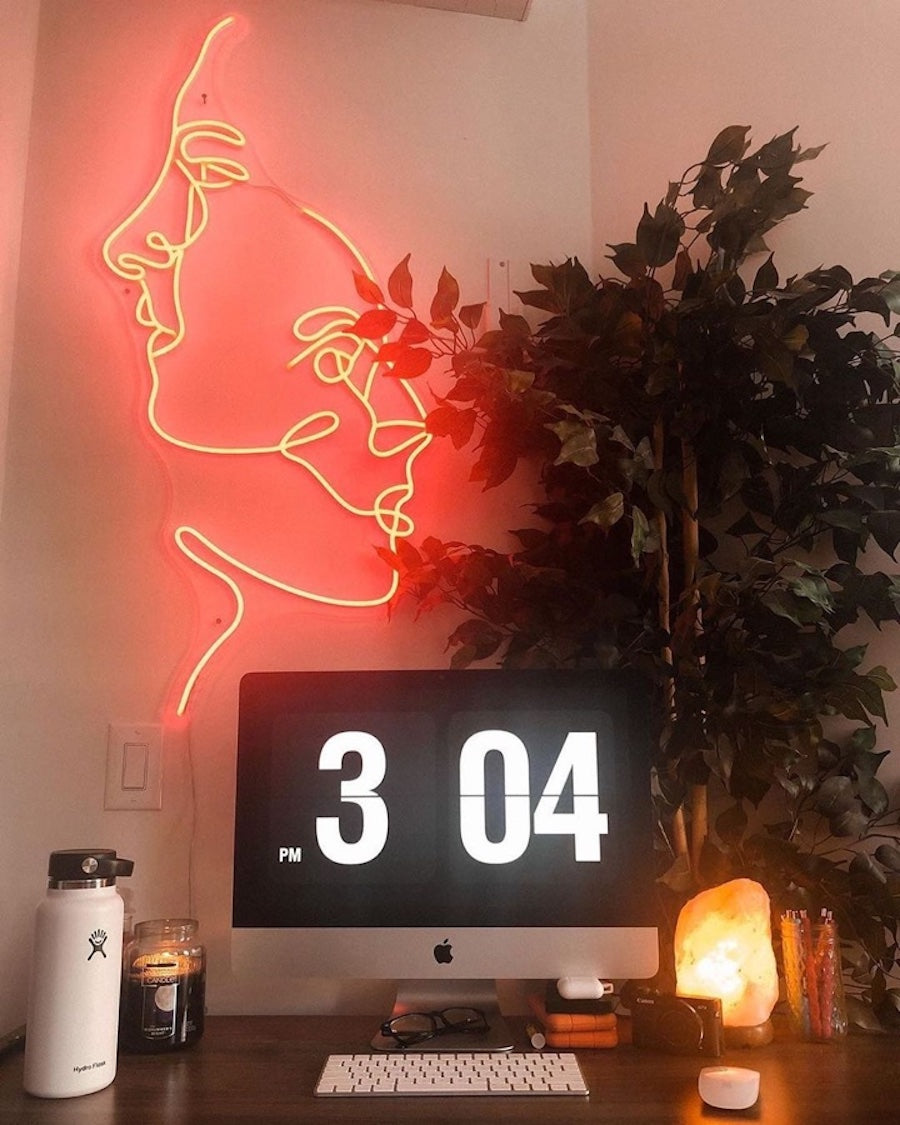 Hanging the LED Neon Sign next to your wall decor or art