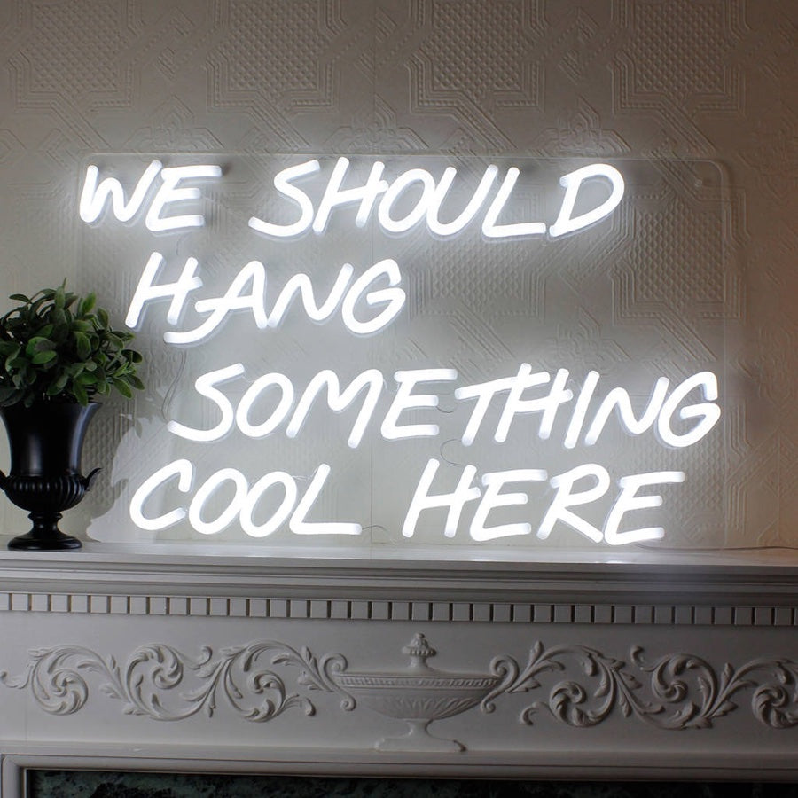 Hanging the LED Neon Sign above the fireplace