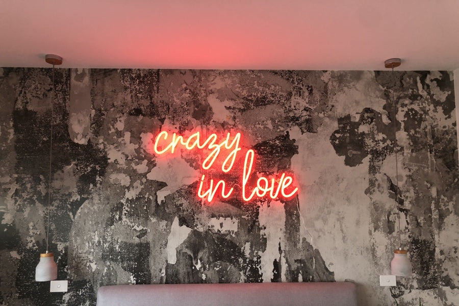 An intimate red neon sign for the couple's bedroom