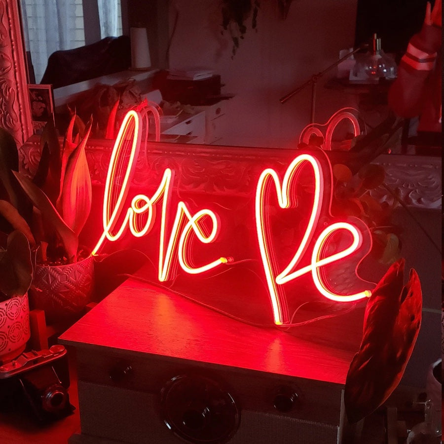 The fiery red neon sign screams for romance and love 