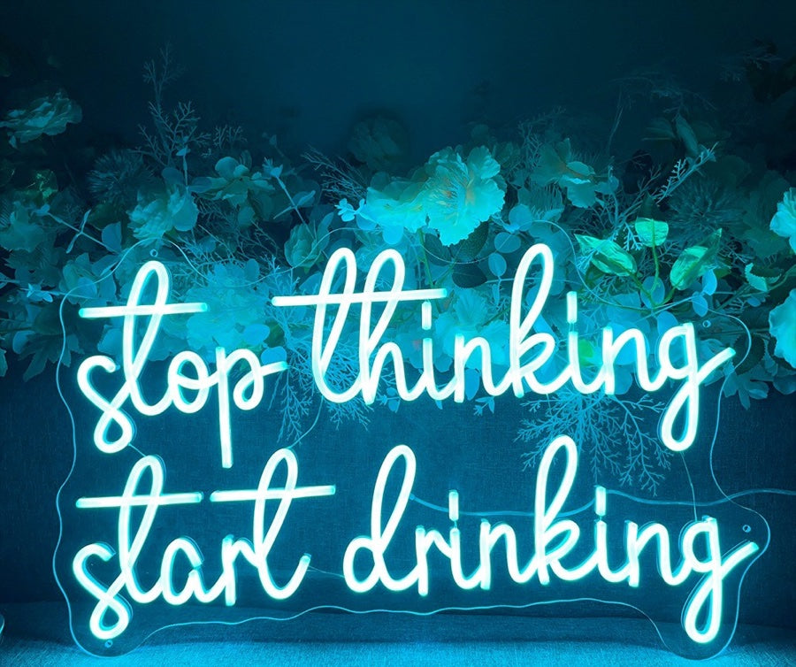 "Stop thinking start drinking" LED sign