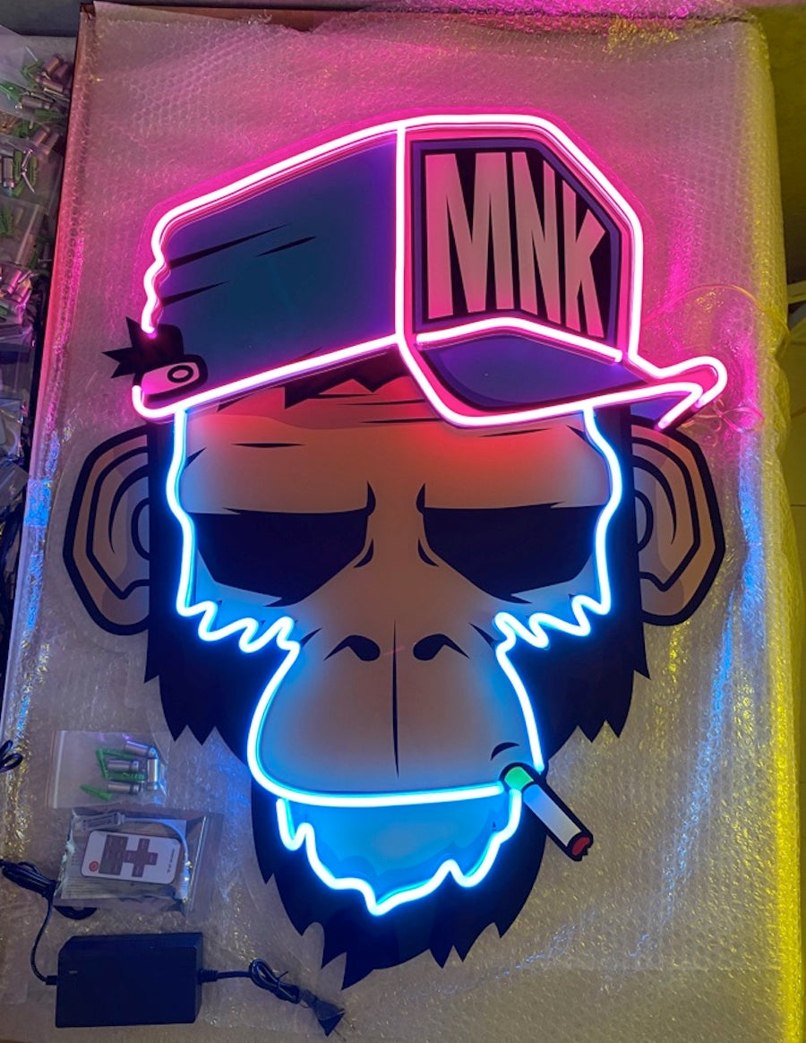 Clean and well-maintained “Monkey Smoke” custom outdoor signs