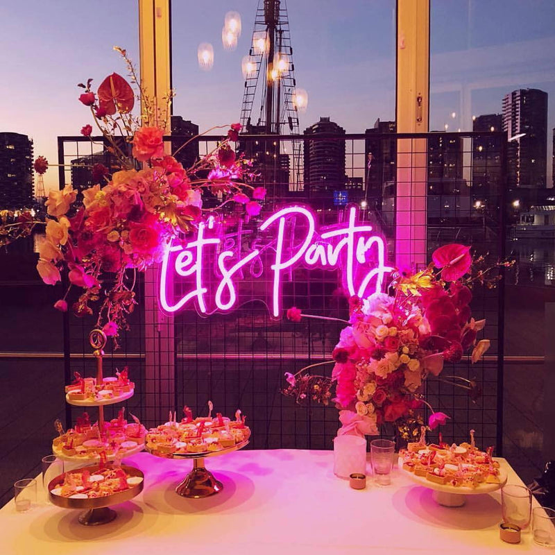 Let's Party emits dazzling neon lights at the dessert table
