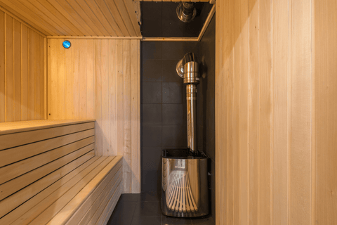 sauna heater in corner of sauna