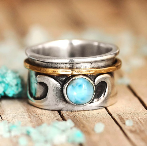 genuine blue larimar gemstone and sterling silver ocean waves inspired fidget spinner ring for women available at boho magic