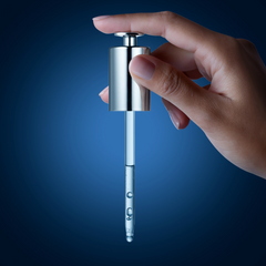 HYDRA-HYAL SERUM'S pipette in a woman's hand