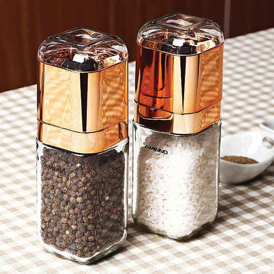 https://cdn.shopify.com/s/files/1/0616/2448/4017/products/180ml-Simple-Fashion-Glass-Bottle-Practical-Golden-Pepper-Hand-Grinder-Pepper-Salt-Mill-Grinder-Kitchen-Tool.9.jpg?v=1655816900&width=533