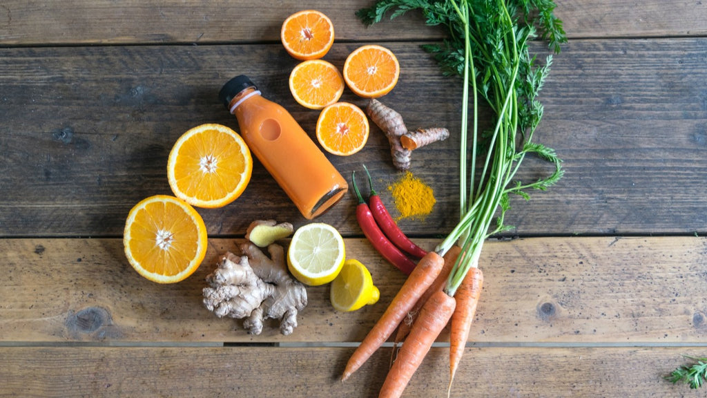 Orange and carrot juice with fresh ingredients, a natural remedy for quick healing of ripped skin after waxing.