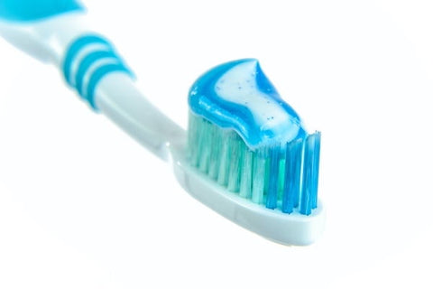 Toothpaste on a toothbrush