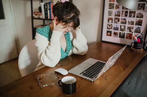 Woman having anxiety at work