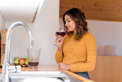 Beautiful woman drinking wine