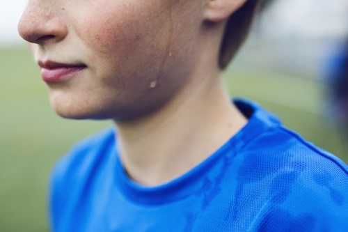 Close up of a teenager sweating