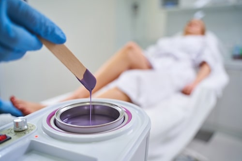 Professional waxing treatment in a clinic