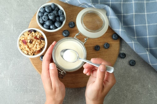 Concept of tasty breakfast with yogurt