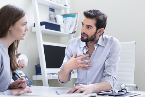 Doctor consulting with patient for personalized acne treatment