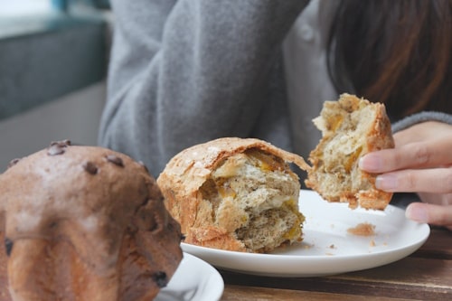 Close up of person eating bread