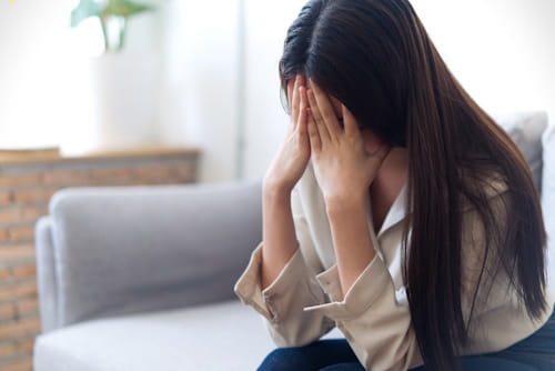 Unhappy woman due to miscarriage
