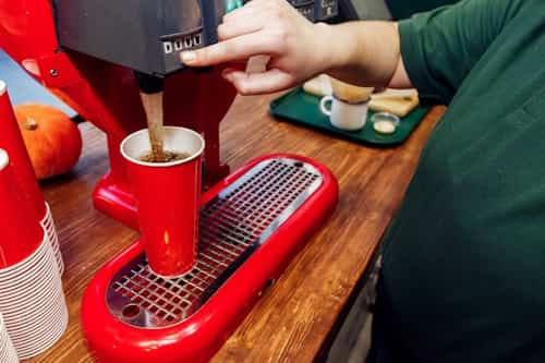 Soda machine dispensing soda