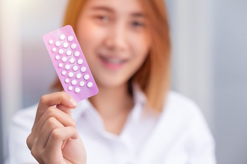 Teen girl with birth control pills combined oral 