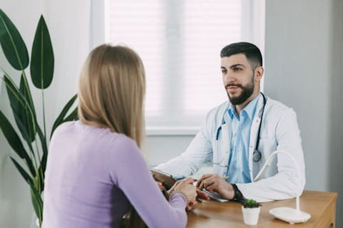 Woman consulting with doctor regarding her Endometriosis
