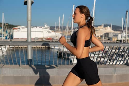 Woman jogging with tight shorts