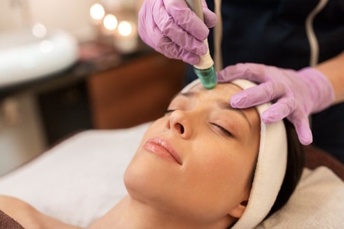 Brightening facial on woman