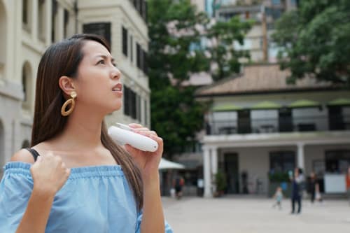 Woman with very hot weather bring a pocket fans
