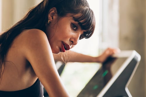 Woman sweating in gym after threadmill