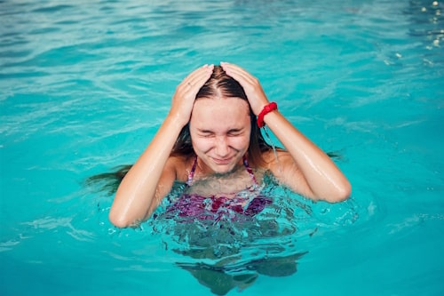 Image of girl swimming in chlorinated pool