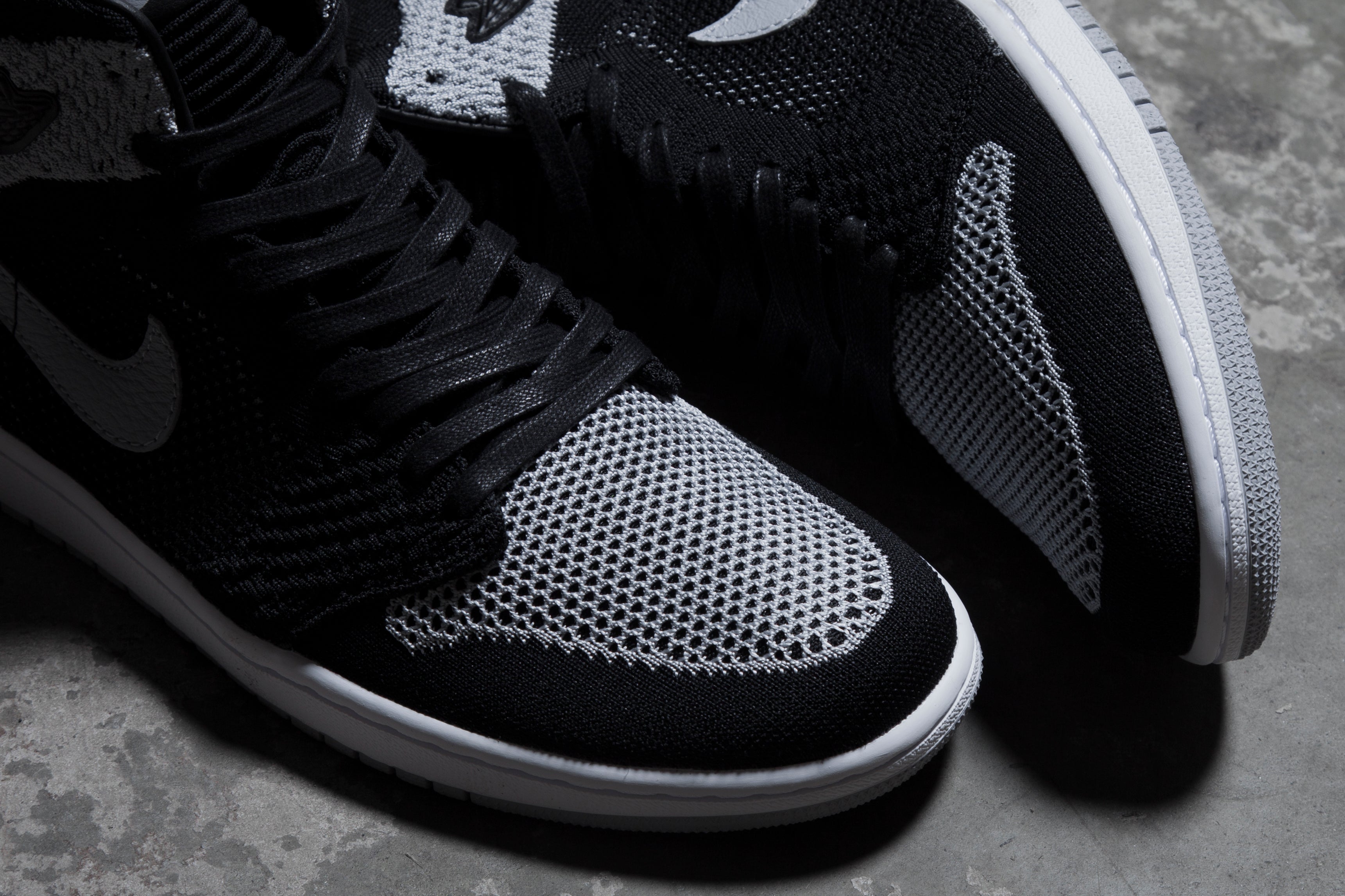 1 RETRO HIGH FLYKNIT BLACK / WOLF GREY | Livestock