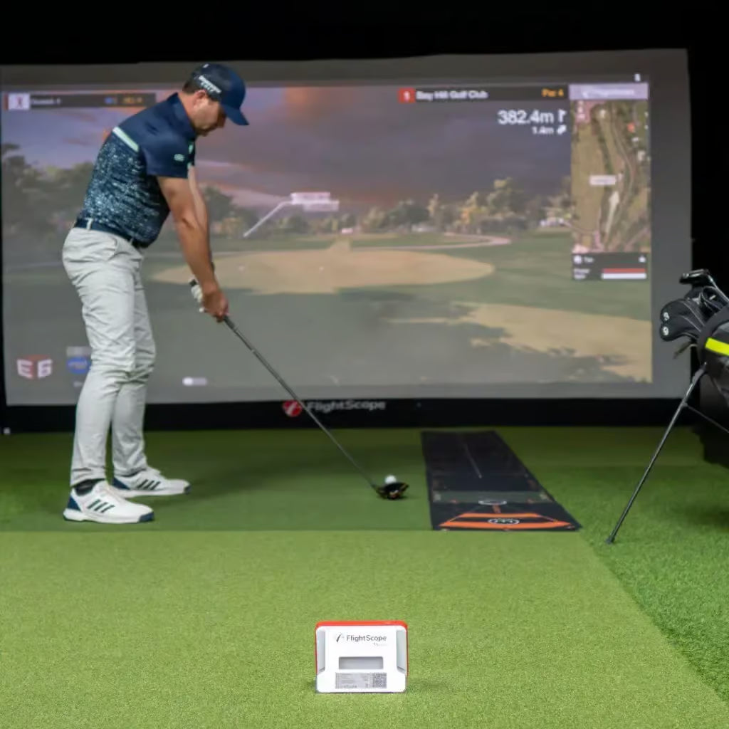 Golfer using Flightscope Mevo+ 2023 Edition Launch Monitor