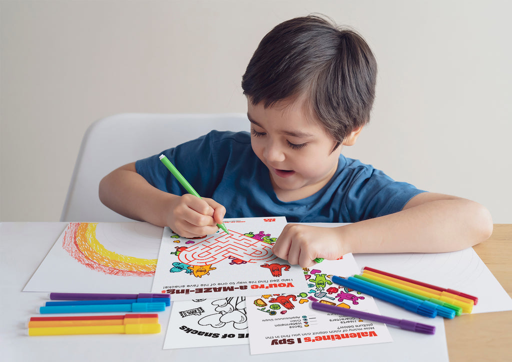 Boy coloring Zee Zees Valentine's Day free printable activity sheets