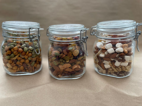 Glass Jars of different trail mixes