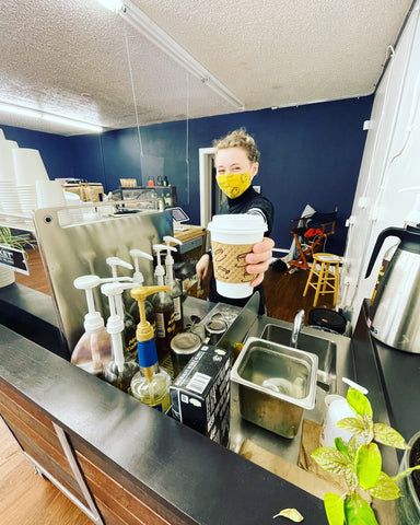 Melinda - Barista at Rocky Butte Coffee Roasters serves a specialty coffee espresso drink