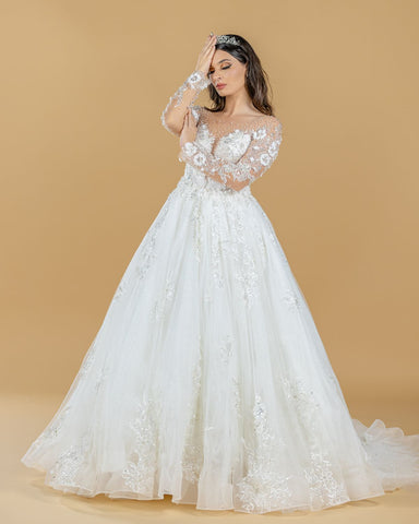 a model showing Anna Sposa Group Wedding dress