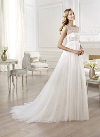 a bride in empire wedding dress